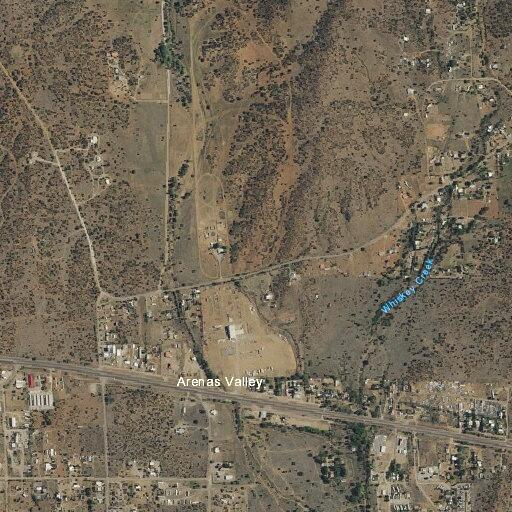 Two cars racing on Highway 180 near Arenas Valley