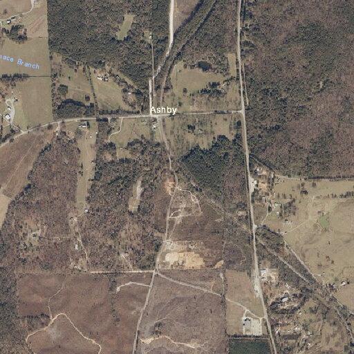 Female sitting near road ditch on Highway 139