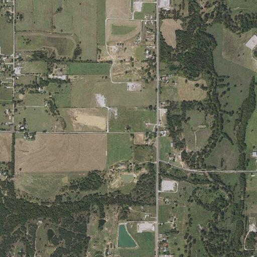 Brush and wood pile fire on Farm to Market Road 730