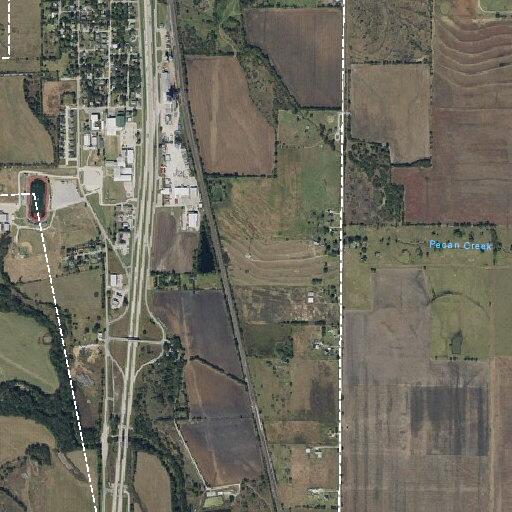 Children toss rocks near vehicles on frontage road