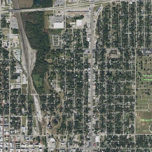 Person looking into parked vehicle reported