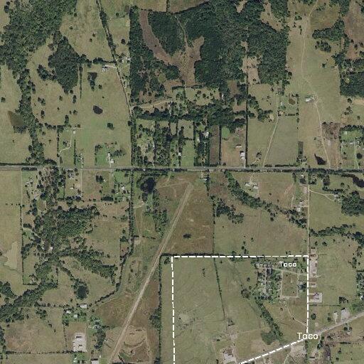 Car stuck in ditch off Highway 82 near liquor store