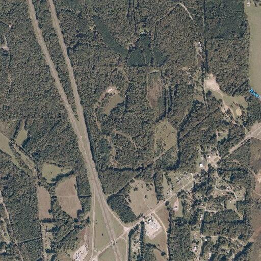 Log blocking Highway 7 near Interstate 55