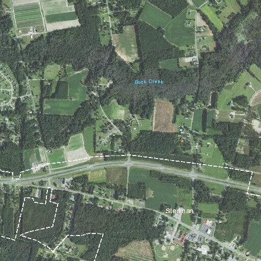 Traffic stop of burgundy Dodge Charger on roadway