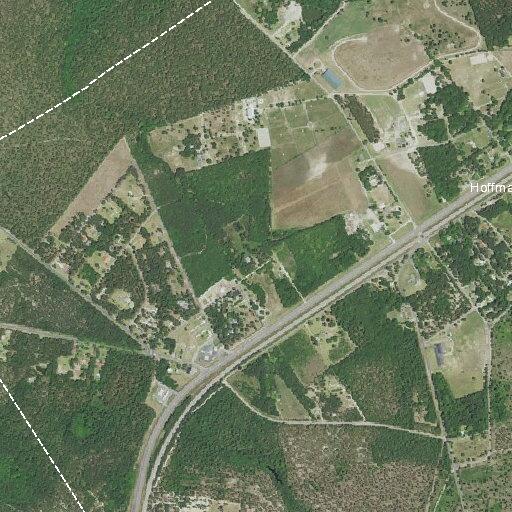 Report of pickup trucks racing on US-1 near Caddell