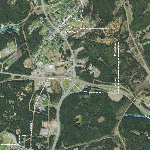 Vehicle off roadway near bridge on Highway 64