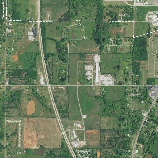 Medical personnel assist patient lift at US Highway 177