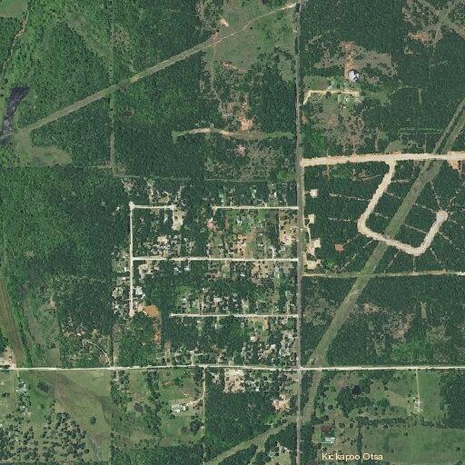 Woman by road threatens to hurt herself in McLoud