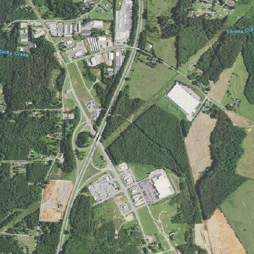 Person running in highway traffic near Bojangles