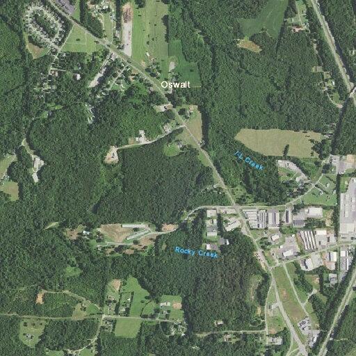 Person experiencing routine back pain at Amity Road