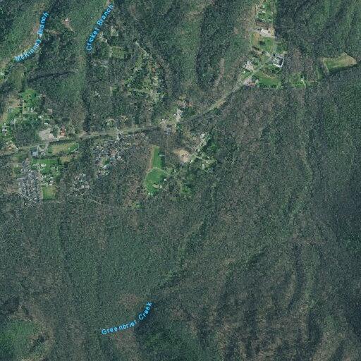 Lingering brush fire near Laurel Springs Road home