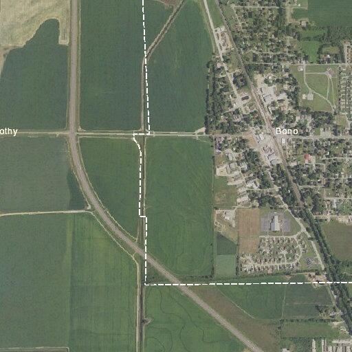 Pickup truck overturned in ditch at intersection