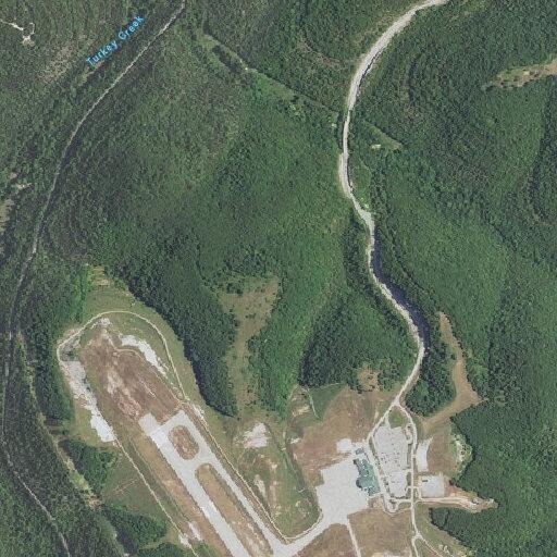 Blue motorcycle leaves Branson Airport area