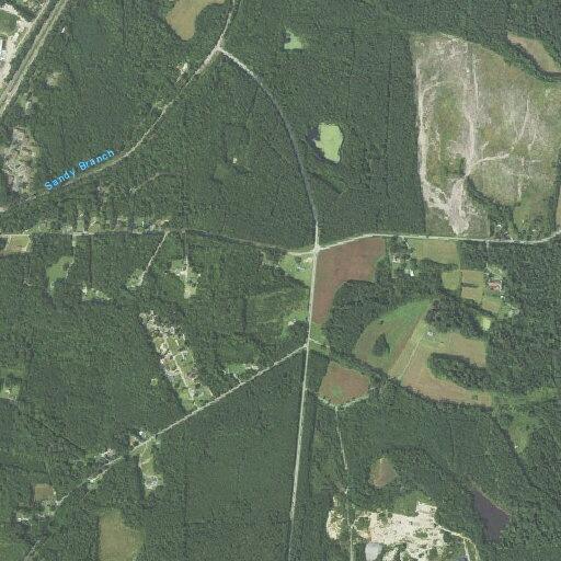 Brush fire at dog cage spreads toward nearby woods