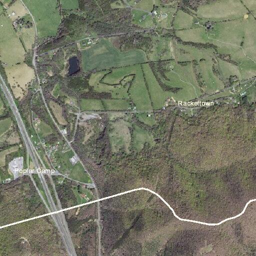 Hay bale on fire at Brown Town Road property