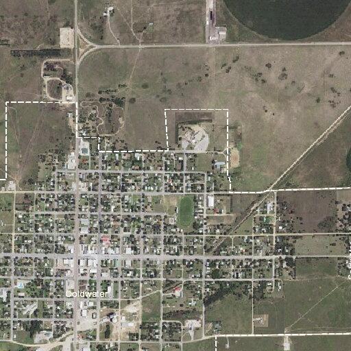 Controlled burn of yard debris on East 1st Street