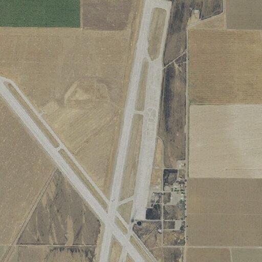 Suspicious person with shovel at airport facility