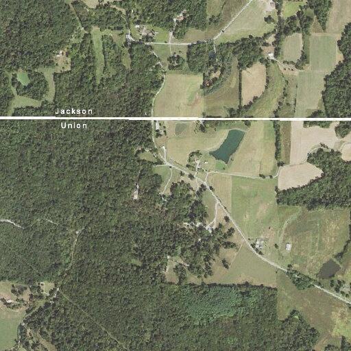 Woman injured after rolling riding lawnmower on herself