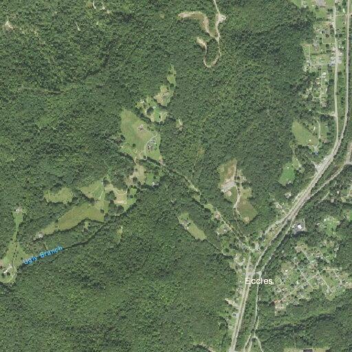 Tree blocking railroad tracks near Harper Road