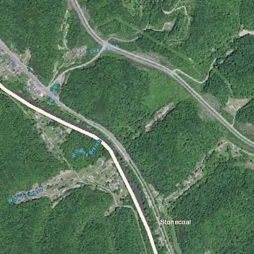 Brush fire caused by welding sparks near train bridge