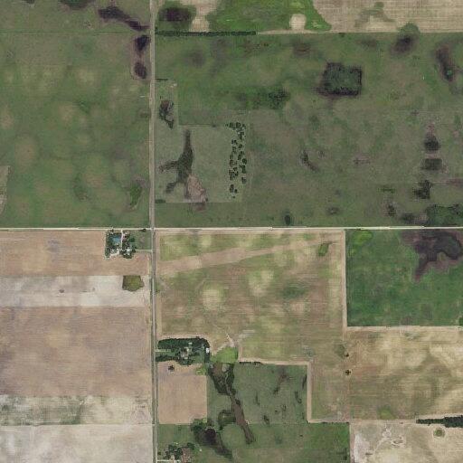 Combine and wheat field fire near homestead