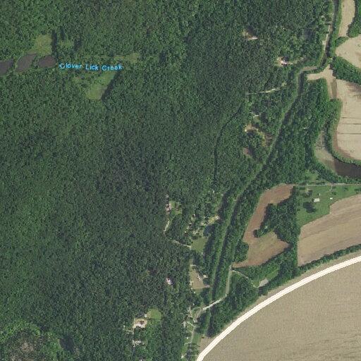 Abandoned vehicle blocking roadway near Mano Point