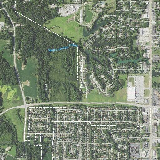 Youths riding bikes in yard after warning