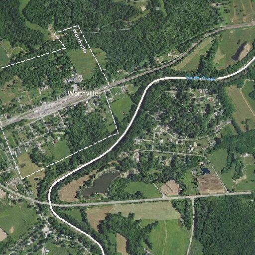 Man slumped over in wheelchair by roadside near campground