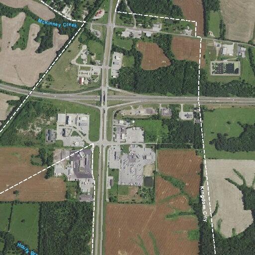 Hit-and-run between two tractor trailers in lot