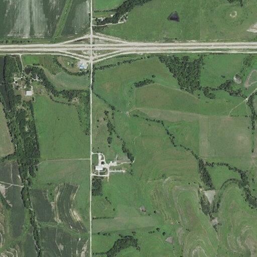 Trespassers fishing on ranch pond near highway
