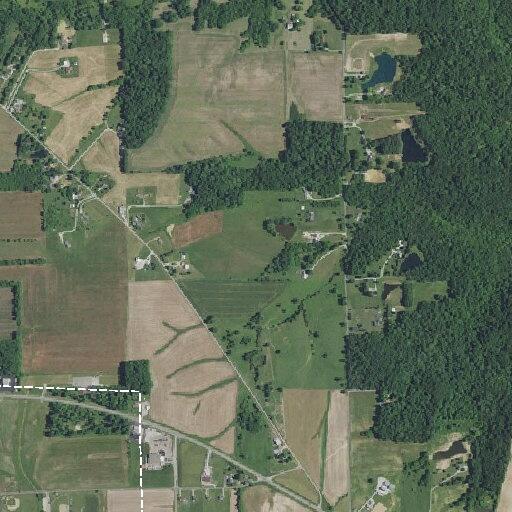Brush fire near propane tank on North Old Milan Road