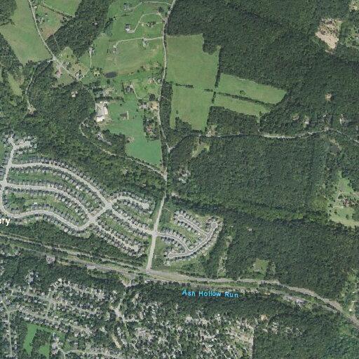Juveniles riding four-wheelers through neighborhood