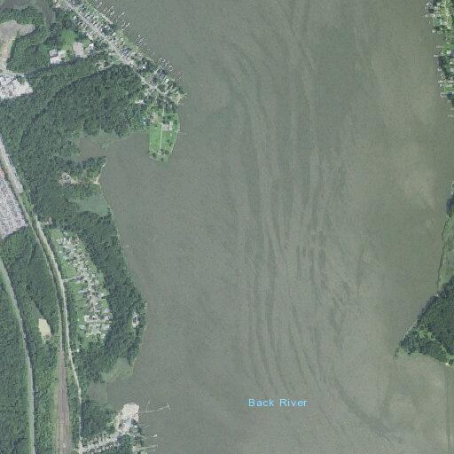 Disabled red sports boat near Shore Road, Sparrows Point