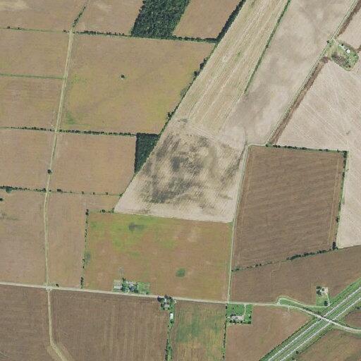 Lawnmower fire spreading to grass near Brock Road