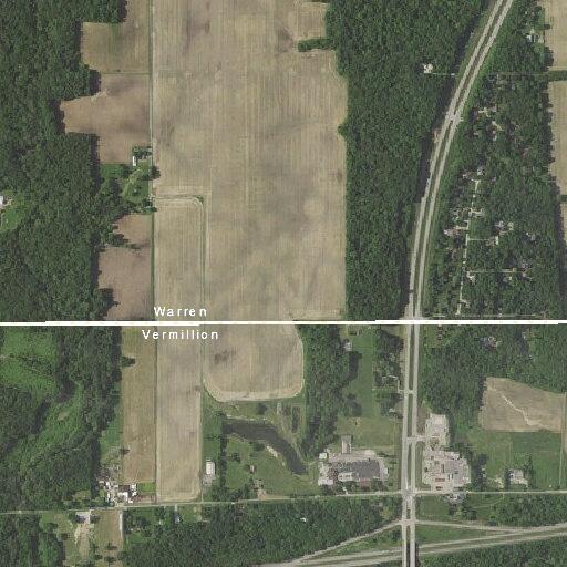 Vehicle slides off wet road into ditch on State Road 63