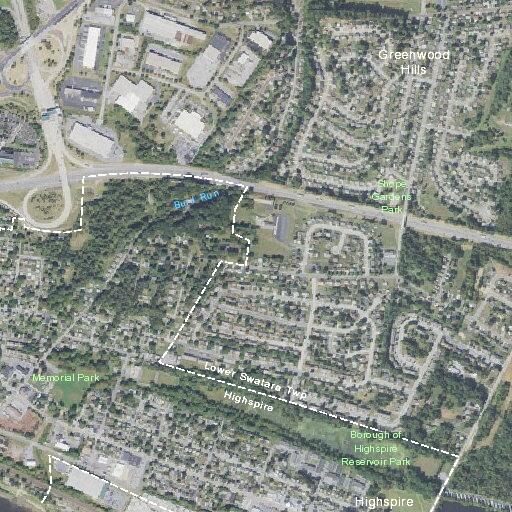 Smoking wire between trees near Willow Street homes