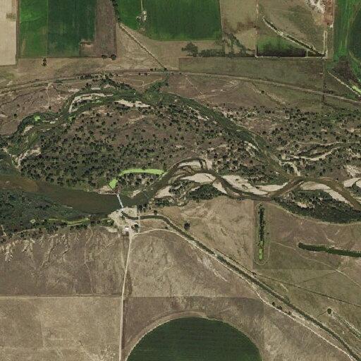 Grass fire near river outside Weldona