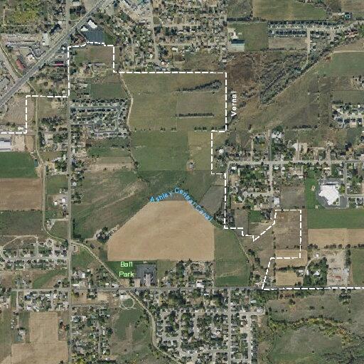 Unattended fire smoldering behind Vernal home