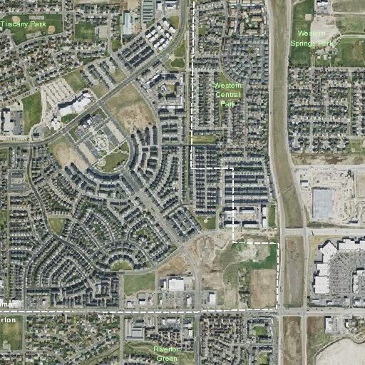 Driver reported holding child on lap in moving vehicle