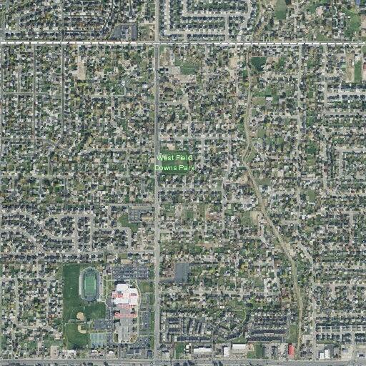 Man walking shirtless and shoeless in roadway in Riverton