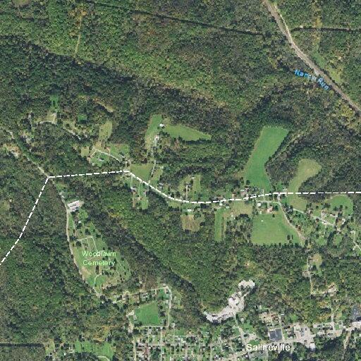 Person flees on foot toward creek after pursuit