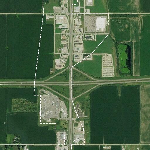 Person panhandling in roadway median at Petro