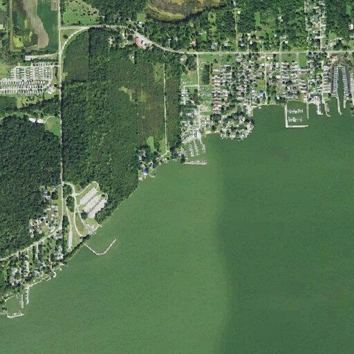 Large tree down on power lines at fishing access
