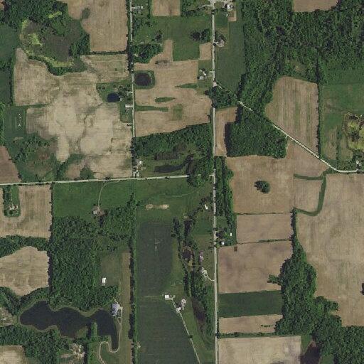 Person assisted from wheelchair to bed near State Road 1