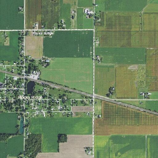 Vehicle with flat tire on eastbound roadway