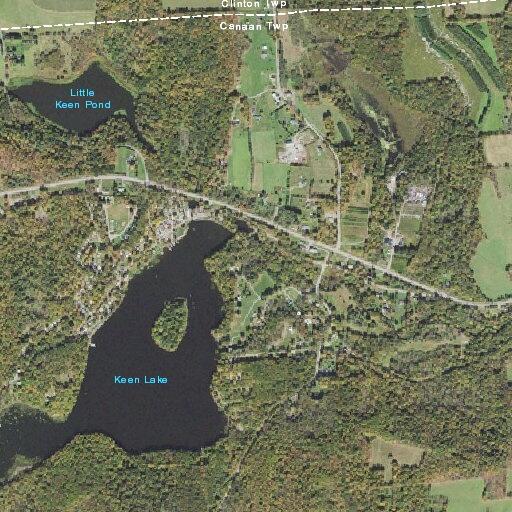 Tree on power lines causing sparks at Canaan Township