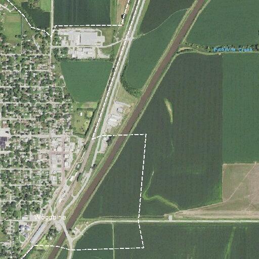 Man walking along Highway 30 near Woodbine