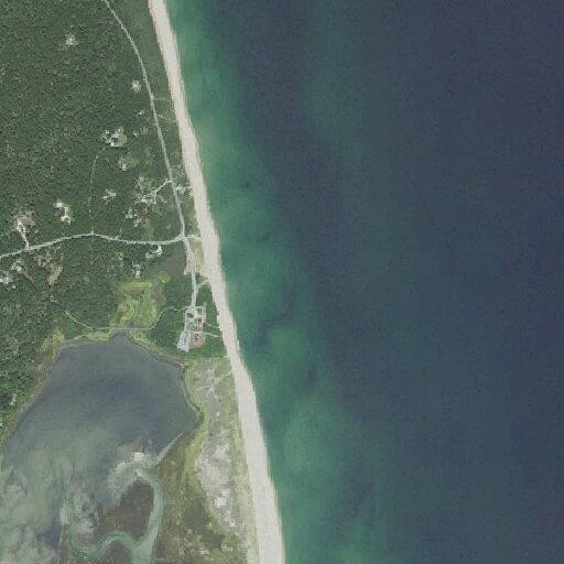 Two persons in distress on surfboards off coast