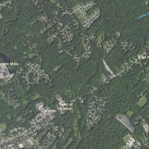 Brush fire reported behind Main Street property