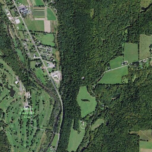 Clothing and possible decaying odor reported near creek on Owego Road